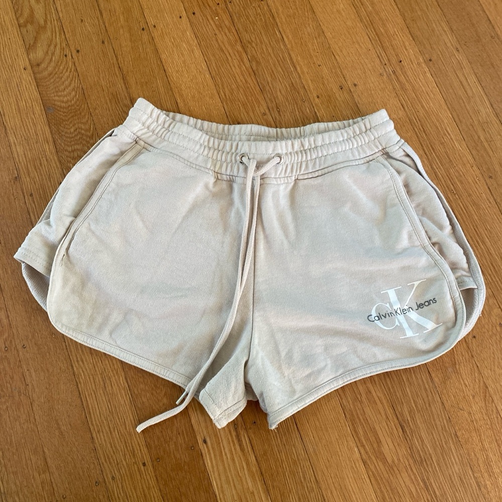 Calvin Klein Jeans cream athletic shorts with pockets